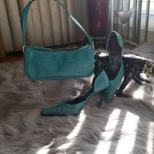 Matching hand bag and shoes color turquoise